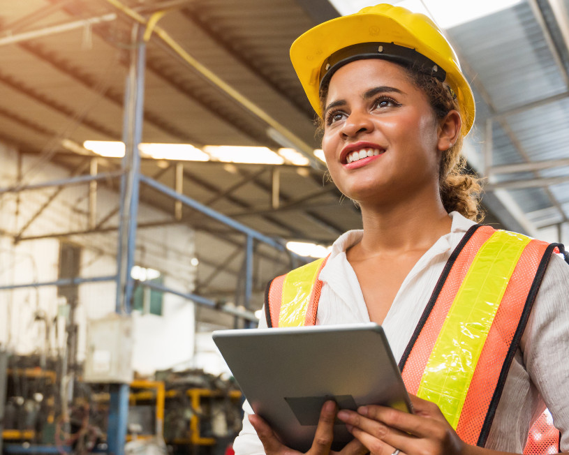 Woman in yellow hardhat