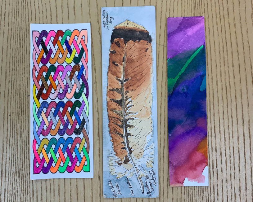 3 hand-made bookmarks on a table